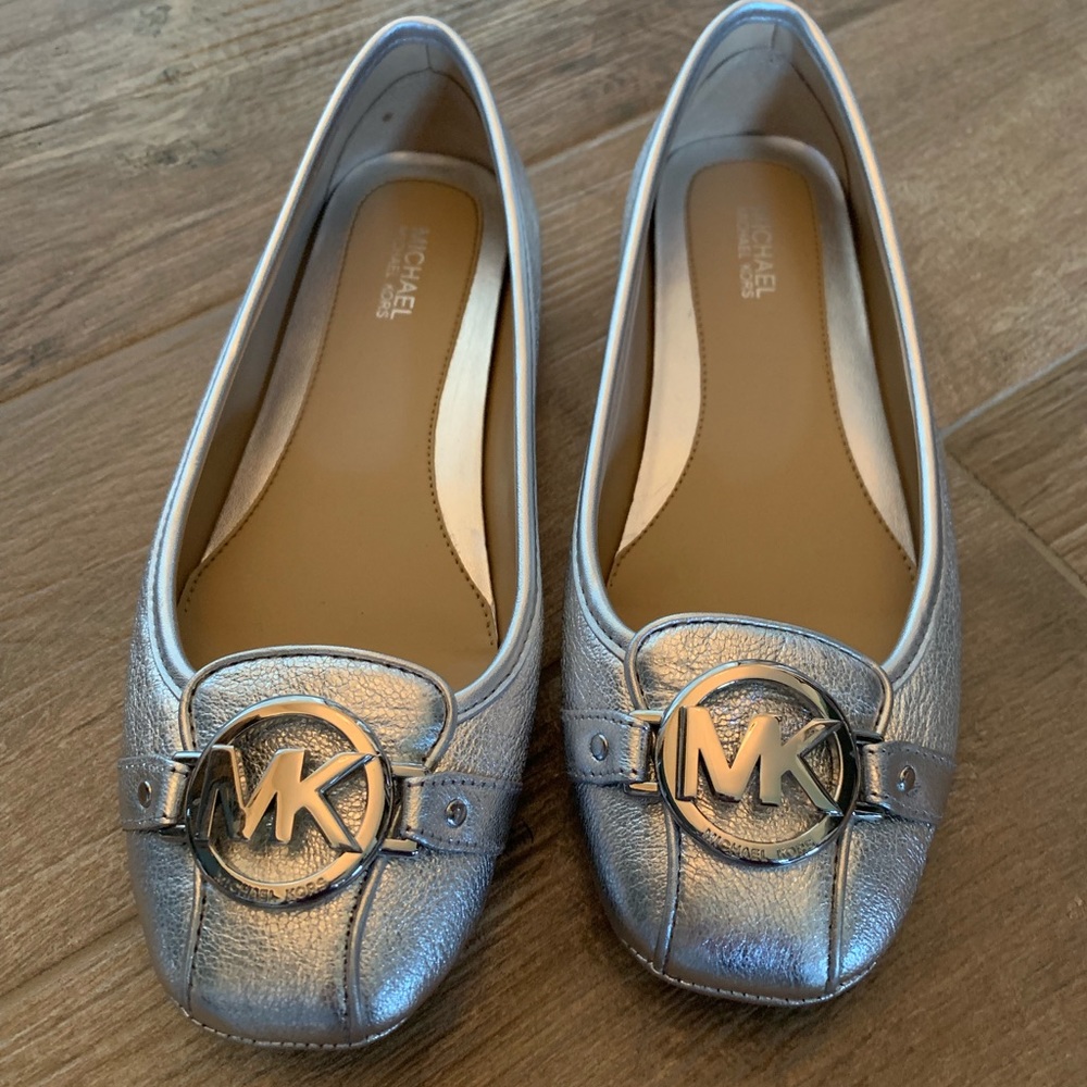 Michael silver emblem slip-on’s